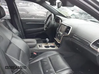 2015 Jeep Grand Cherokee Overland with VIN 1C4RJFCT3FC725239, listed as a IAAI auction lot 41779555 with 100,837 mi miles. Bid and sale history available at carsss.com. Image 5.