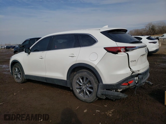 2020 Mazda CX-9 Touring with VIN JM3TCACY2L0407342, listed as a Copart auction lot 47590235 with 59,667 mi miles and Salvage title. Bid and sale history available at DreamBid. Image 2.