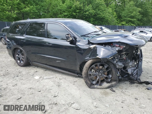 2022 Dodge Durango R/T with VIN 1C4SDJCT3NC231327, listed as a Copart auction lot 56165565 with 61,456 mi miles and Salvage title. Bid and sale history available at DreamBid. Image 4.