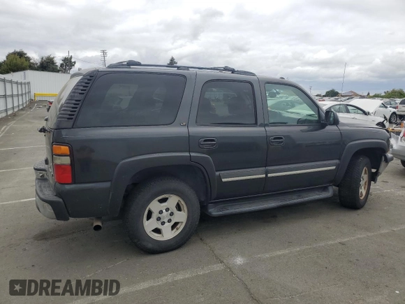 2005 Chevrolet Tahoe Z71 with VIN 1GNEC13T85R141076, listed as a Copart auction lot 54733415 with 310,992 mi miles and Salvage title. Bid and sale history available at DreamBid. Image 3.