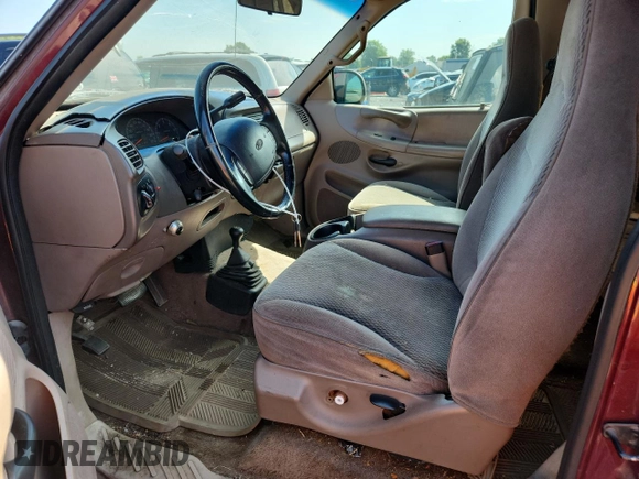 1997 Ford F-150 XL z VIN 1FTDX186XVKB29967, wystawiony jako Copart lot #63531805 z przebiegiem 178 616 mil mil oraz Czysty tytuł • Clean title. Historia ofert i sprzedaży dostępna na DreamBid. Obrazek 7.