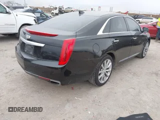 2017 Cadillac XTS Luxury with VIN 2G61M5S39H9166549, listed as a IAAI auction lot 41593859 with 164,557 mi miles. Bid and sale history available at carsss.com. Image 4.