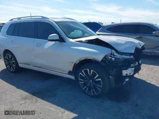 2020 BMW X7 xDrive40i with VIN 5UXCW2C00L9A03002, listed as a IAAI auction lot 41856130 with 33,713 mi miles. Bid and sale history available at carsss.com. Image 1.