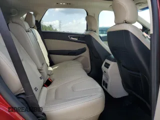 2015 Ford Edge Titanium z VIN 2FMPK3K81FBB11530, wystawiony jako Copart lot #57769795 z przebiegiem 108 844 mil mil oraz Szkoda całkowita • Salvage title. Historia ofert i sprzedaży dostępna na DreamBid. Obrazek 11.