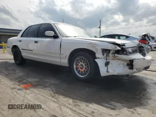 2000 Mercury Grand Marquis GS z VIN 2MEFM74WXYX699560, wystawiony jako Copart lot #57721925 z przebiegiem 246 297 mil mil oraz Szkoda całkowita • Salvage title. Historia ofert i sprzedaży dostępna na DreamBid. Obrazek 4.
