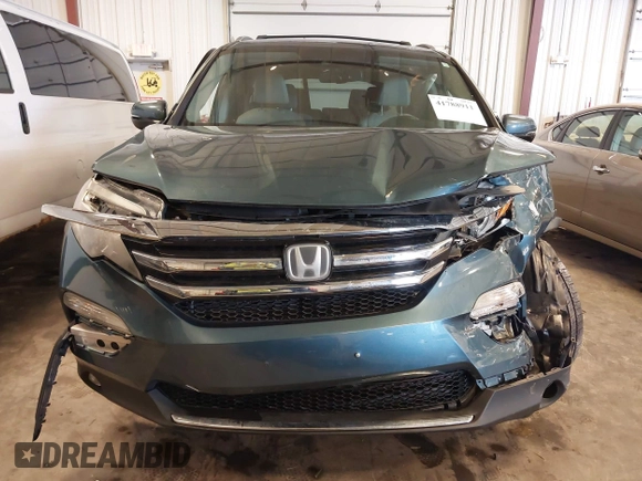 2016 Honda Pilot Elite with VIN 5FNYF6H09GB085621, listed as a IAAI auction lot 41788911 with 137,199 mi miles. Bid and sale history available at carsss.com. Image 13.