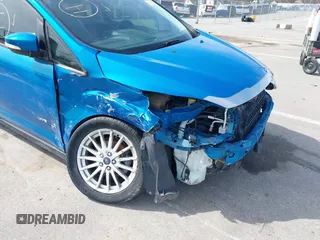 2013 Ford C-Max SE z VIN 1FADP5AU3DL540691, wystawiony jako IAAI lot #41839755 z przebiegiem 146 348 mil mil oraz . Historia ofert i sprzedaży dostępna na DreamBid. Obrazek 6.