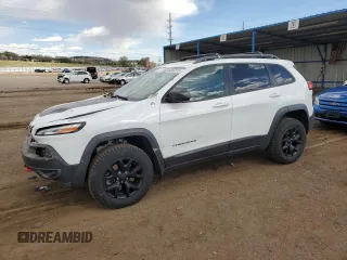 2015 Jeep Cherokee Trailhawk z VIN 1C4PJMBS5FW614095, wystawiony jako Copart lot #54387075 z przebiegiem 138 372 mil mil oraz Szkoda całkowita • Salvage title. Historia ofert i sprzedaży dostępna na DreamBid. Obrazek 1.