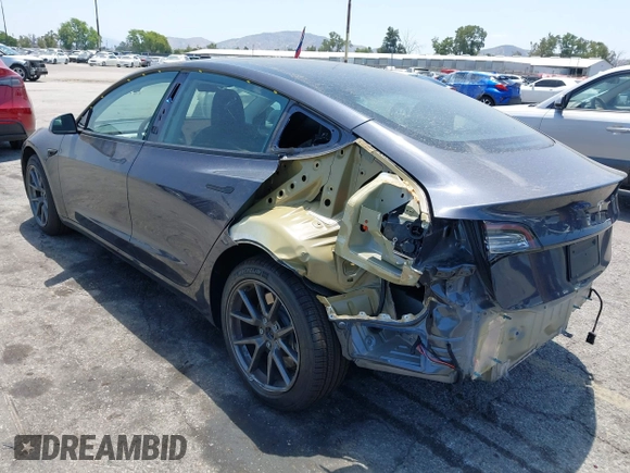 2023 Tesla Model 3 with VIN 5YJ3E1EA4PF400306, listed as a IAAI auction lot 42398603 with 18,551 mi miles and . Bid and sale history available at DreamBid. Image 3.