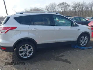 2015 Ford Escape Titanium with VIN 1FMCU9J98FUC76491, listed as a IAAI auction lot 41790638 with 158,196 mi miles and . Bid and sale history available at DreamBid. Image 13.