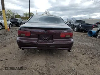 1995 Chevrolet Caprice with VIN 1G1BL52P0SR152620, listed as a Copart auction lot 53154365 with 223,365 mi miles and Salvage Title. Bid and sale history available at DreamBid. Image 6.