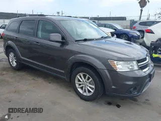 2017 Dodge Journey SXT with VIN 3C4PDCBG3HT618930, listed as a IAAI auction lot 41956400 with 106,185 mi miles and . Bid and sale history available at carsss.com. Image 1.