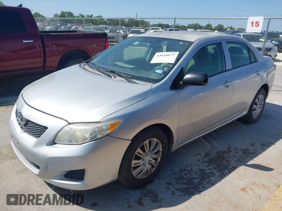 2009 Toyota Corolla with VIN 1NXBU40E79Z134599, listed as a IAAI auction lot 42035077 with 154,051 mi miles. Bid and sale history available at carsss.com. Image 2.