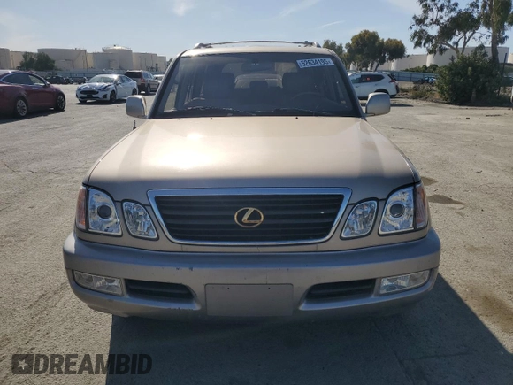 2001 Lexus LX 470 z VIN JTJHT00W213507042, wystawiony jako Copart lot #52634195 z przebiegiem 179 707 mil mil oraz Tytuł czysty. Historia ofert i sprzedaży dostępna na DreamBid. Obrazek 5.