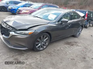 2018 Mazda Mazda6 Touring with VIN JM1GL1VM5J1309174, listed as a IAAI auction lot 41730175 with 107,423 mi miles. Bid and sale history available at carsss.com. Image 16.