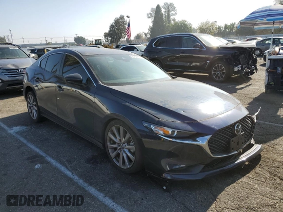 2021 Mazda 3 Select with VIN 3MZBPABLXMM251688, listed as a Copart auction lot 85704604 with 51,866 mi miles and Salvage title. Bid and sale history available at DreamBid. Image 4.