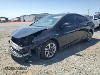 2017 Toyota Prius Two z VIN JTDKARFU7H3051056, wystawiony jako Copart lot #59293075 z przebiegiem 90 632 mil mil oraz Szkoda całkowita • Salvage title. Historia ofert i sprzedaży dostępna na DreamBid. Obrazek 1.