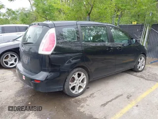 2010 Mazda 5 Sport with VIN JM1CR2W33A0360848, listed as a IAAI auction lot 42104824 with 151,084 mi miles and . Bid and sale history available at DreamBid. Image 4.