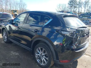 2021 Mazda CX-5 Grand Touring with VIN JM3KFBDM3M1318248, listed as a IAAI auction lot 41678260 with 71,903 mi miles. Bid and sale history available at carsss.com. Image 3.