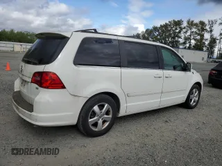 2011 Volkswagen Routan SE with VIN 2V4RW3DG0BR789523, listed as a Copart auction lot 61761785 with 124,530 mi miles and Clean title. Bid and sale history available at DreamBid. Image 3.