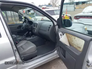 2005 Ford Escape Hybrid with VIN 1FMCU95H05KC95225, listed as a IAAI auction lot 41798610 with 216,659 mi miles and . Bid and sale history available at DreamBid. Image 5.
