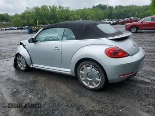 2013 Volkswagen Beetle 2.5L w/Sound/Nav z VIN 3VW5P7ATXDM812019, wystawiony jako Copart lot #56921485 z przebiegiem Nie podano mil oraz Szkoda całkowita • Salvage title. Historia ofert i sprzedaży dostępna na DreamBid. Obrazek 2.