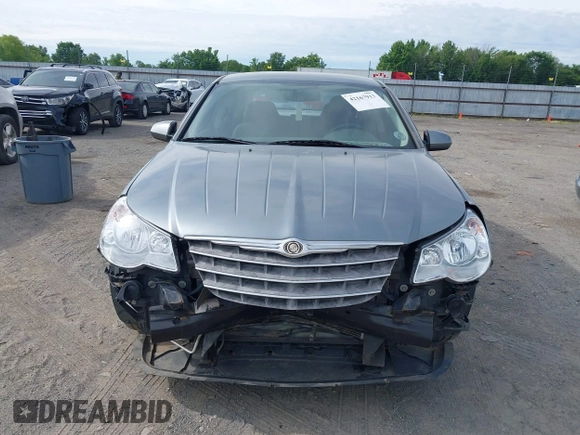 2007 Chrysler Sebring Touring z VIN 1C3LC56KX7N542931, wystawiony jako IAAI lot #42167913 z przebiegiem 240 638 mil mil oraz . Historia ofert i sprzedaży dostępna na DreamBid. Obrazek 6.