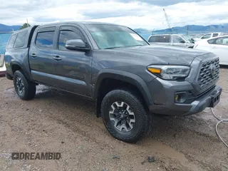 2023 Toyota Tacoma SR z VIN 3TYCZ5AN7PT161385, wystawiony jako IAAI lot #41763493 z przebiegiem 22 243 mil mil oraz . Historia ofert i sprzedaży dostępna na DreamBid. Obrazek 1.