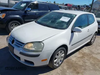 2009 Volkswagen Rabbit S with VIN WVWAB71K59W106364, listed as a IAAI auction lot 41862718 with 125,538 mi miles. Bid and sale history available at carsss.com. Image 6.