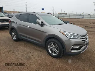 2017 Hyundai Santa Fe 2.4L z VIN 5NMZUDLB7HH030253, wystawiony jako Copart lot #51302445 z przebiegiem 136 074 mil mil oraz Szkoda całkowita • Salvage title. Historia ofert i sprzedaży dostępna na DreamBid. Obrazek 4.