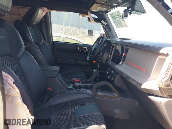 2023 Ford Bronco Raptor with VIN 1FMEE5JR7PLC04106, listed as a IAAI auction lot 42316422 with 6,859 mi miles and . Bid and sale history available at DreamBid. Image 5.