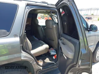 2001 Chevrolet Tahoe LT with VIN 1GNEC13T21R189733, listed as a IAAI auction lot 42323154 with 296,349 mi miles and . Bid and sale history available at DreamBid. Image 8.