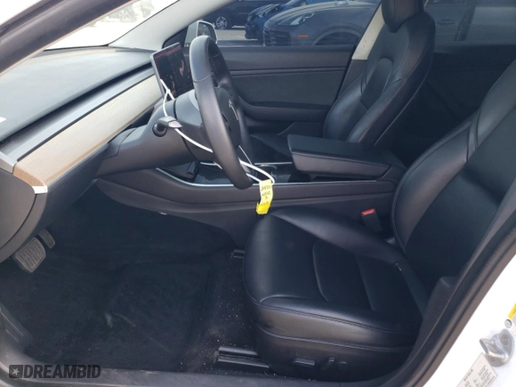 2019 Tesla Model 3 Mid Range with VIN 5YJ3E1EAXKF426451, listed as a Copart auction lot 72082134 with 86,555 mi miles and Salvage Title. Bid and sale history available at carsss.com. Image 7.