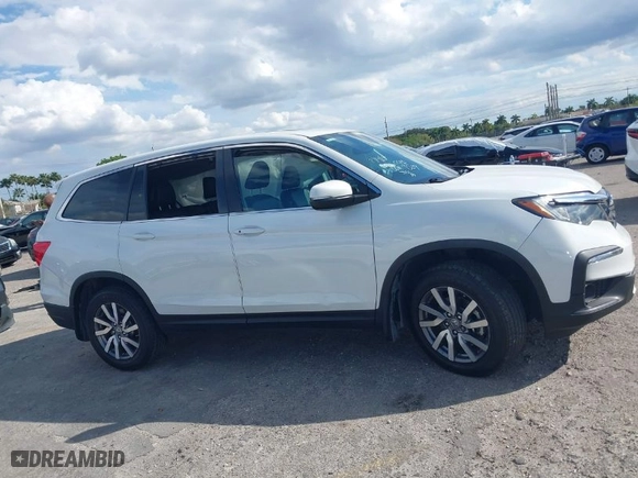 2021 Honda Pilot EX-L with VIN 5FNYF5H55MB039589, listed as a IAAI auction lot 41694567 with 58,685 mi miles. Bid and sale history available at carsss.com. Image 13.