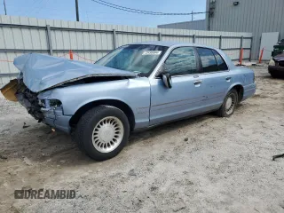 1998 Ford Crown Victoria LX с VIN 2FAFP74W3WX162752, выставлен на аукционе Copart как лот 72498904 с пробегом Не указан миль и Списание • Salvage title. История ставок и продаж доступна на DreamBid. Изображение 1.
