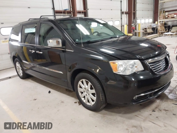 2012 Chrysler Town & Country Touring L with VIN 2C4RC1CGXCR170910, listed as a IAAI auction lot 41911179 with 167,850 mi miles and . Bid and sale history available at carsss.com. Image 1.