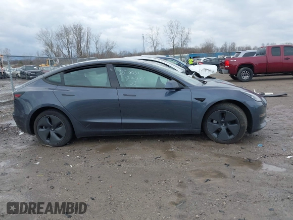 2022 Tesla Model 3 Long Range with VIN 5YJ3E1EB8NF201023, listed as a IAAI auction lot 41942943 with 30,635 mi miles and . Bid and sale history available at DreamBid. Image 12.