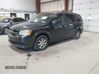 2012 Dodge Grand Caravan SXT with VIN 2C4RDGCG4CR224850, listed as a IAAI auction lot 42070300 with 177,982 mi miles and . Bid and sale history available at DreamBid. Image 2.