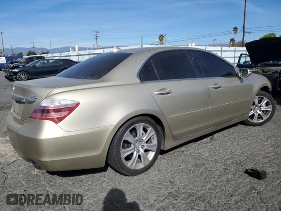 2009 Acura RL Tech Pkg with VIN JH4KB26609C002495, listed as a Copart auction lot 42647185 with 116,942 mi miles and Salvage Title. Bid and sale history available at carsss.com. Image 3.