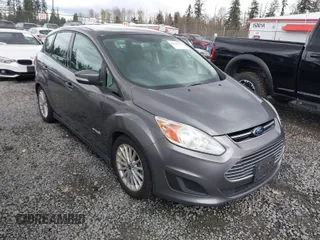 2013 Ford C-Max SE z VIN 1FADP5AU7DL511937, wystawiony jako IAAI lot #41909936 z przebiegiem 165 061 mil mil oraz . Historia ofert i sprzedaży dostępna na DreamBid. Obrazek 1.