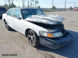2002 Mercury Grand Marquis LS Premium with VIN 2MEFM75W12X628429, listed as a IAAI auction lot 41671887 with 262,706 mi miles. Bid and sale history available at carsss.com. Image 1.