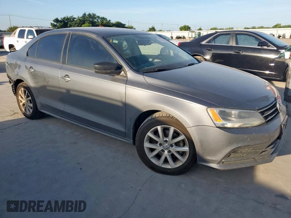 2015 Volkswagen Jetta Sport with VIN 3VWB17AJ0FM281709, listed as a Copart auction lot 62726005 with 169,516 mi miles and Salvage title. Bid and sale history available at DreamBid. Image 4.