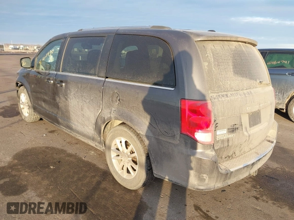 2019 Dodge Grand Caravan SXT with VIN 2C4RDGCG0KR633684, listed as a IAAI auction lot 41460470 with 101,801 mi miles. Bid and sale history available at carsss.com. Image 3.