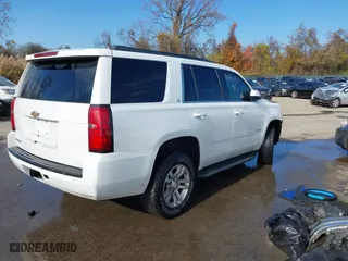 2016 Chevrolet Tahoe LS with VIN 1GNSKAKC2GR408884, listed as a IAAI auction lot 40885051 with 124,858 mi miles. Bid and sale history available at carsss.com. Image 4.
