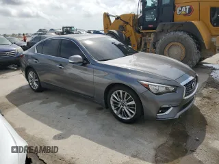 2023 Infiniti Q50 Luxe z VIN JN1EV7BR2PM541987, wystawiony jako Copart lot #53506195 z przebiegiem 65 202 mil mil oraz Szkoda całkowita • Salvage title. Historia ofert i sprzedaży dostępna na DreamBid. Obrazek 4.