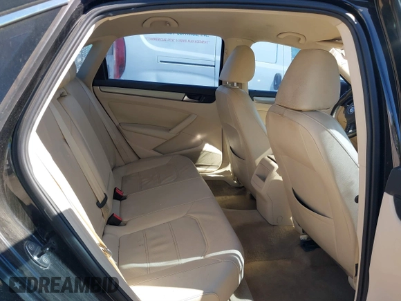 2014 Volkswagen Passat Wolfsburg Edition with VIN 1VWAS7A30EC041800, listed as a IAAI auction lot 41769648 with 120,645 mi miles and . Bid and sale history available at DreamBid. Image 8.