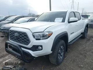 2023 Toyota Tacoma SR5 z VIN 3TMDZ5BN2PM144461, wystawiony jako IAAI lot #41565934 z przebiegiem 75 547 mil mil oraz . Historia ofert i sprzedaży dostępna na DreamBid. Obrazek 17.