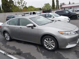 2015 Lexus ES 300h with VIN JTHBW1GG6F2093327, listed as a IAAI auction lot 42107023 with 102,502 mi miles and . Bid and sale history available at DreamBid. Image 14.