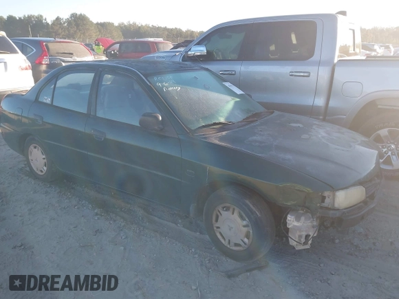 1999 Mitsubishi Mirage DE z VIN JA3AY26A0XU017889, wystawiony jako IAAI lot #40457172 z przebiegiem Nie podano mil oraz . Historia ofert i sprzedaży dostępna na DreamBid. Obrazek 1.