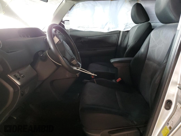 2012 Scion xB with VIN JTLZE4FE5CJ023537, listed as a Copart auction lot 55863315 with 230,648 mi miles and Salvage Title. Bid and sale history available at DreamBid. Image 7.
